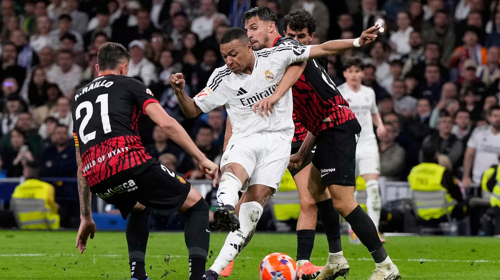 Real Madrid Holds Off Mallorca with Last-Minute Goal to Delay Barcelona’s La Liga Title